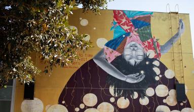 Moon Beholders mural painted by Artist Katie Yamasaki